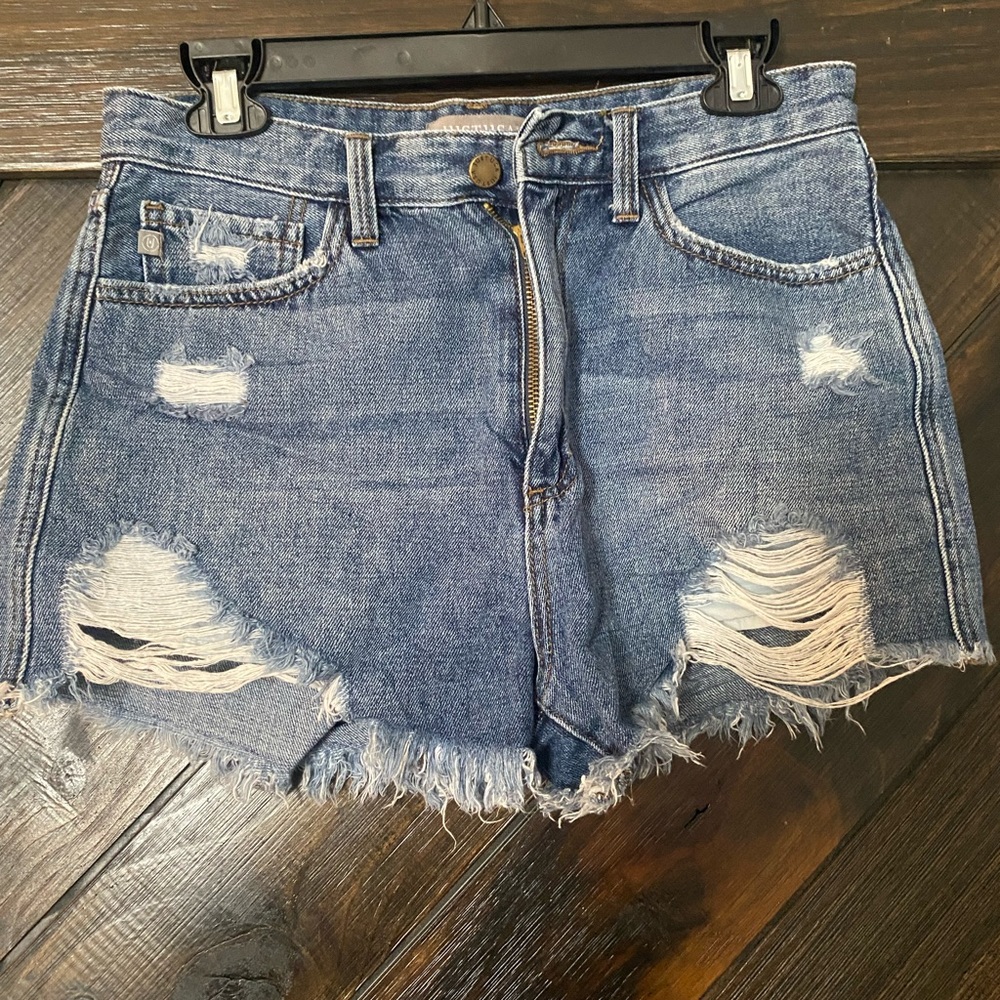 Boutique denim distressed shorts. Size Large- fits like a 27